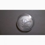 Продам серебряную монету 50 центов