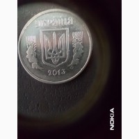 Продам монету Украины 5 коп.2013 г.с браком на аверсе