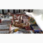 Коллекция миниатюрных моделей города и железной дороги